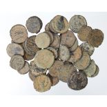 Roman, late small bronze coins (40) mixed grade with a sandy deposit.