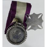 Scottish silver School items comprising a silver medal for the Edinburgh Angus Club dated 1872-72 to