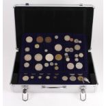 World Coins, a collection in a 7-tray metal carry case (with key), many highlights noted, much