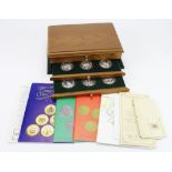 World Conservation Series Silver Proof Collection. 24 Crown-sized coins from the 1970s in a wooden