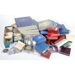 Assortment of mainly GB in a stacker box, includes part filled Whitman folders, boxed Crowns,