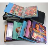 Large collection of modern trade sets (not checked) in plastic sleeves / binders, several special