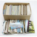 Shoebox packed with various old and modern Foreign topo and subject postcards. (100's)
