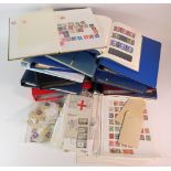 GB - a substantial clear plastic tub of material in albums and stockbooks (approx 12), album pages