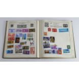 Old green Strand Stamp Album, lots of stamps. Very little picked (Qty)