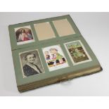Edwardian postcard album with metal clasp, containing good selection of Comic, London and general