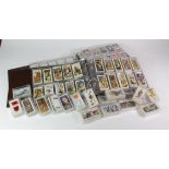 Cigarette Card sets loose in small plastic cases, and in sleeves in 2x modern albums. Sets