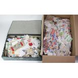 World stamps - large amount of loose on and off paper material in a boxfile and loose in a red