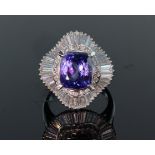 Platinum ballerina ring set with central cushion cut AAAA tanzanite weighing 4.56ct, surrounded by