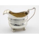 George III silver cream jug, hallmarked 'I.B, London 1817', height 9.5cm approx., weight 5.6 oz.