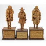 Criminal interest. Three hand carved wooden figures, depicting interesting characters in history,