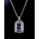 9ct yellow gold pendant set with central cushion shaped rainbow quartz weighing 2.96ct and