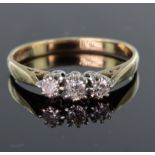 9ct yellow gold claw set diamond three stone ring, diamond weight calculated as totalling approx.