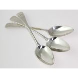 Three George III silver old English pattern table spoons, each with monogram to handle, hallmarked