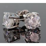 18ct white gold diamond single stone stud earrings with a total carat weight of 2.11ct, each round