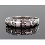 18ct white gold diamond set band ring set with alternate sections of round brilliant cut and