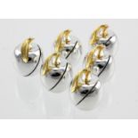 Six white metal place name card holders in the shape of an apple, contained in an Asprey box