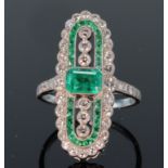 Platinum emerald and diamond Art Deco style lozenge shaped ring set with central emerald cut emerald