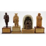 Four hand carved wooden figures, depicting interesting characters in history, each mounted on a hand