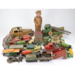 Tinplate. A collection of tinplate toys, including lorries, trains, a fire engine, etc., some