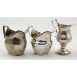 Three George III silver milk and cream jugs, hallmarked London 1775, 1804 & 1805, tallest 11cm
