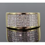 18ct yellow gold wide band set with seventy princess cut diamonds in an invisible setting, total