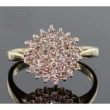 9ct yellow gold tiered diamond cluster dress ring set with round brilliant cut diamonds calculated