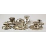 Six silver capstan inkwells, weighted bases, mostly with glass liners, two damaged (sold as seen)