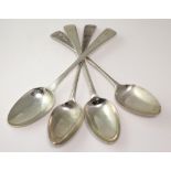 Two pairs of George III silver old English pattern table spoons, both pairs with monogram to