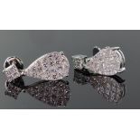 18ct white gold diamond drop earrings comprising an offset square stud set with four princess cut