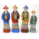 Four Chinese polychrome figures, circa late 19th to early 20th Century, largest 26cm approx.