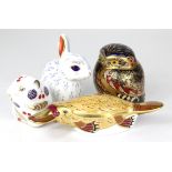Mixed collection of four Royal Crown Derby Paperweights with silver stoppers.
