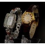 Two "Gems TV" quartz wristwatches, one gold plated with 12 gem stones as markers along with a
