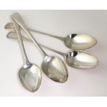 Two pairs of George III silver old English pattern table spoons, both pairs with initials to