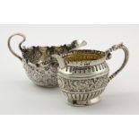 Two Victorian silver milk jugs, hallmarked Sheffield 1894 & 1898, tallest 6.5cm approx., weight 4.