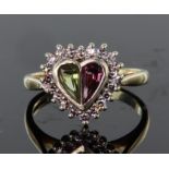 9ct yellow and white gold heart shaped ring set with a pink and green calibre cut tourmaline