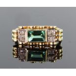 14ct yellow gold dress ring set with rectangular green tourmaline measuring approx. 7mm x 4mm with