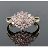 9ct yellow gold diamond cluster ring consisting of twenty five round brilliant cut diamonds