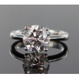 Platinum and diamond solitaire ring comprising a round brilliant cut diamond weighing 3.52ct, set in
