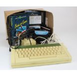 Acorn Electron computer, together with various cassette games, manuals etc. (sold as seen)