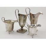 Four silver milk & cream jugs, hallmarked Birmingham 1915, 1917 (weighted base), 1928 & 1929,