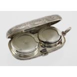 Very attractively engraved silver double sovereign case, lovely item, closes very crisply. Front