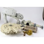Star Wars. A collection of four original Star Wars models, comprising Millennium Falcon, AT-AT, B-