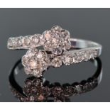 18ct white gold diamond double cluster crossover style ring, each seven stone diamond cluster