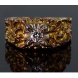 18ct yellow gold heavily textured flared band ring set with a single round brilliant cut diamond