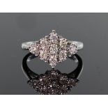 9ct white gold nine stone diamond cluster ring consisting of round brilliant cut diamonds calculated