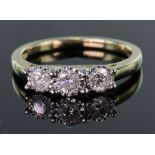 9ct yellow gold ring set with three graduated round brilliant cut diamonds totalling 0.50ct, in an