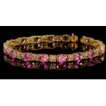 9ct yellow gold tennis bracelet set with seventeen 7mm x 5mm flamingo pink topaz totalling 16.242ct,