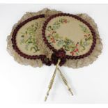 Fans. Two early 20th century embroidered fans with floral decoration and lace surrounds, each with