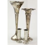 Silver vases. Four silver vases of varying sizes, each with a weighted base, largest 23cm,